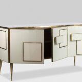 Geometric sideboard in glass and gilded brass. Contemporary Italian work.