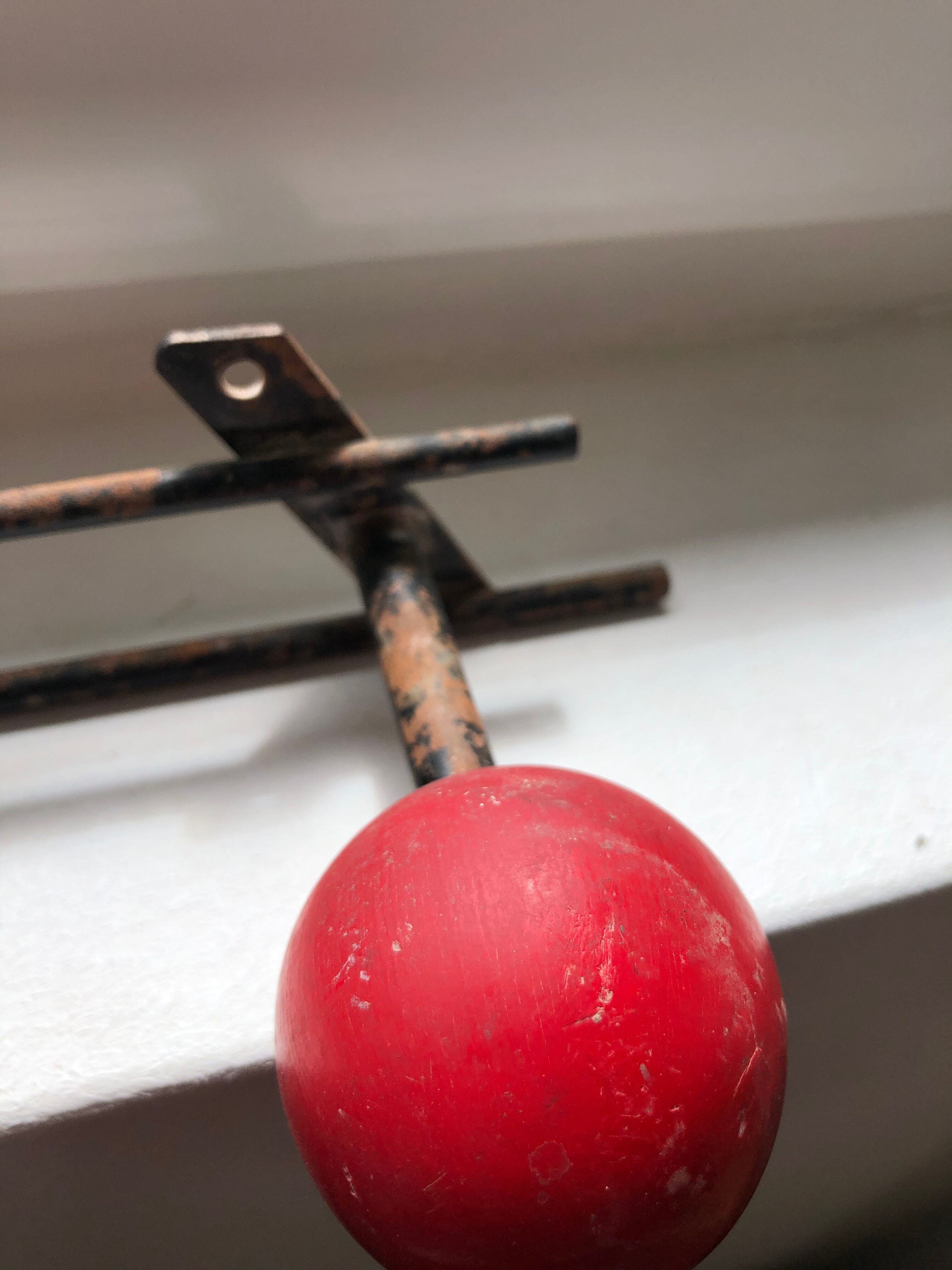 Patère two vintage balls wears old coat