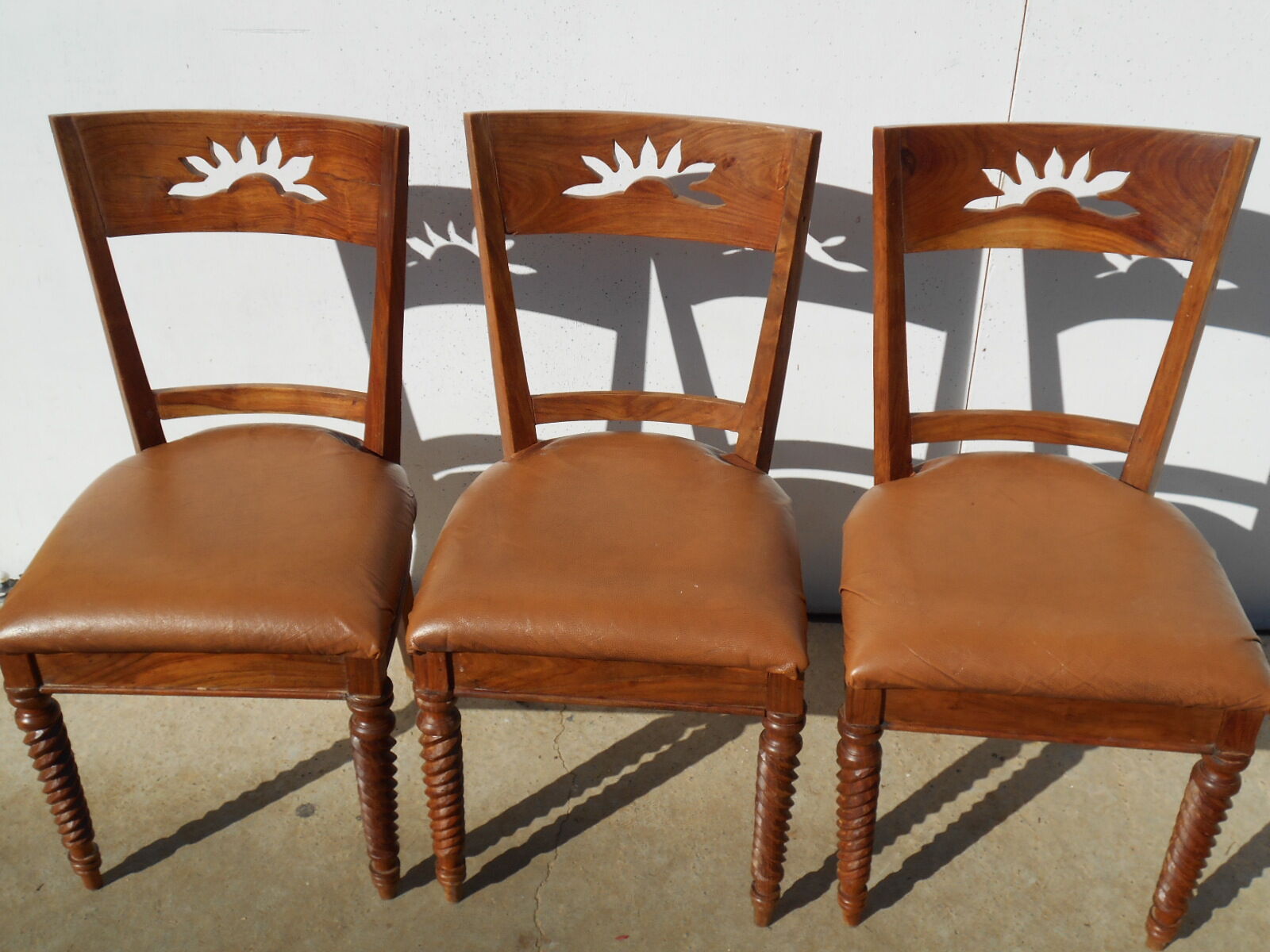 6 exotic wood and leather chairs,