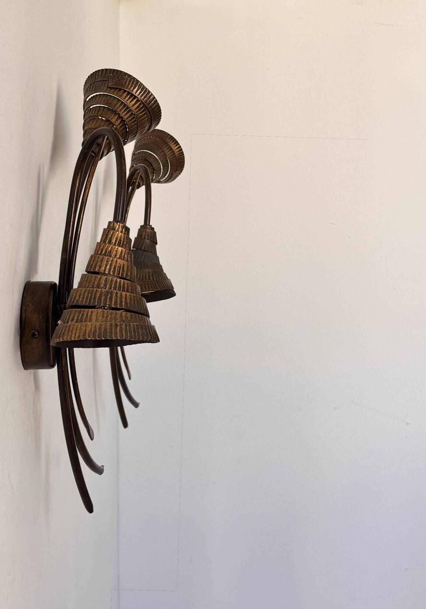 Vintage wall lights in gold metal and brass, France 1980.
