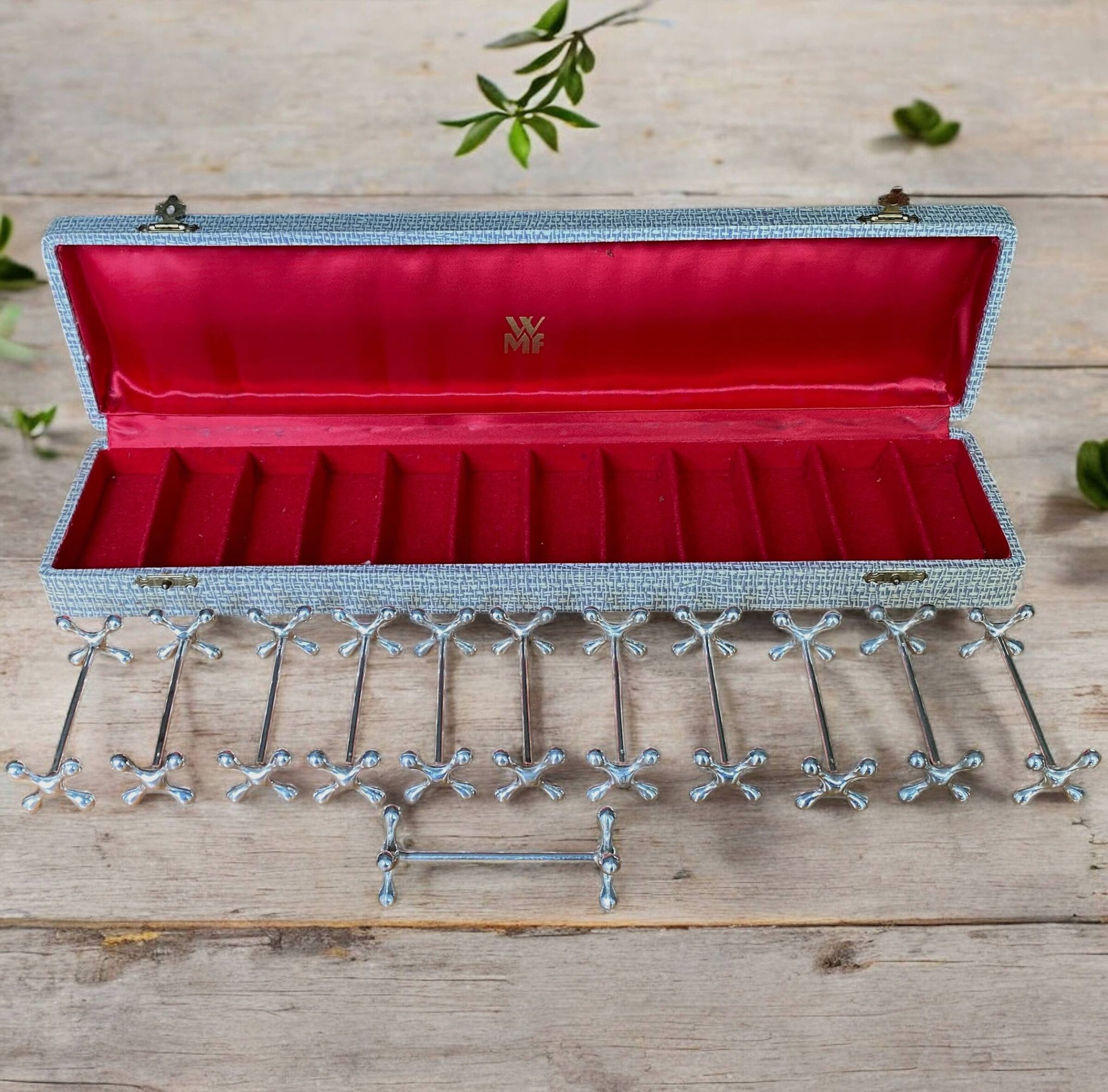 12 WMF silver-plated knife holders, boules model, in a box