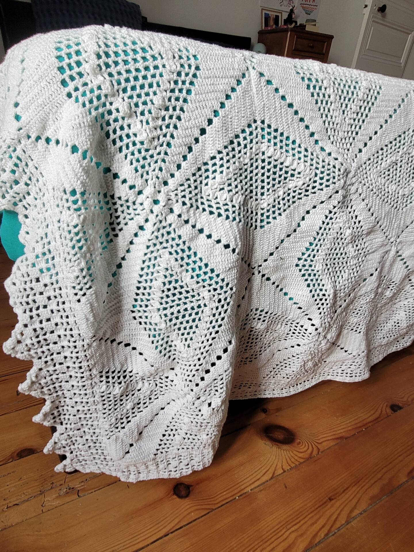 Large white crocheted bedspread
