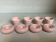 Four double pink candlesticks