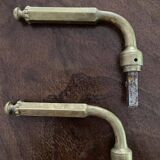 Antique brass door handles.