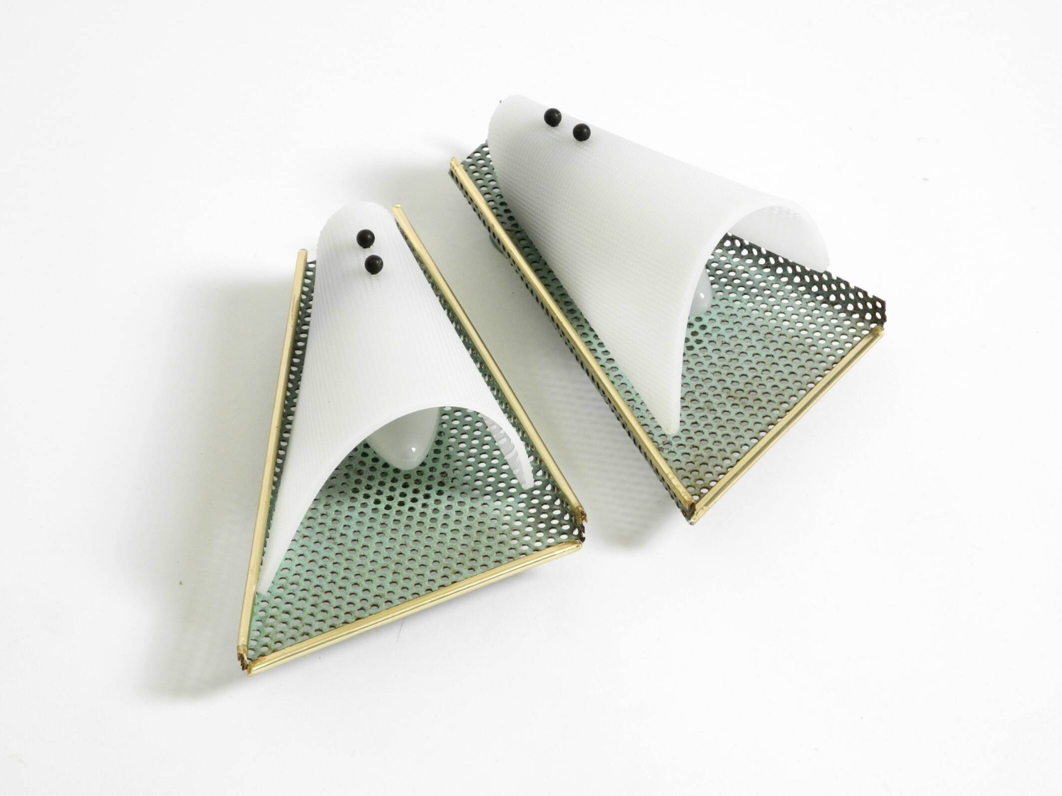 Pair of beautiful mint green Mid Century Modern perforated sheet metal wall