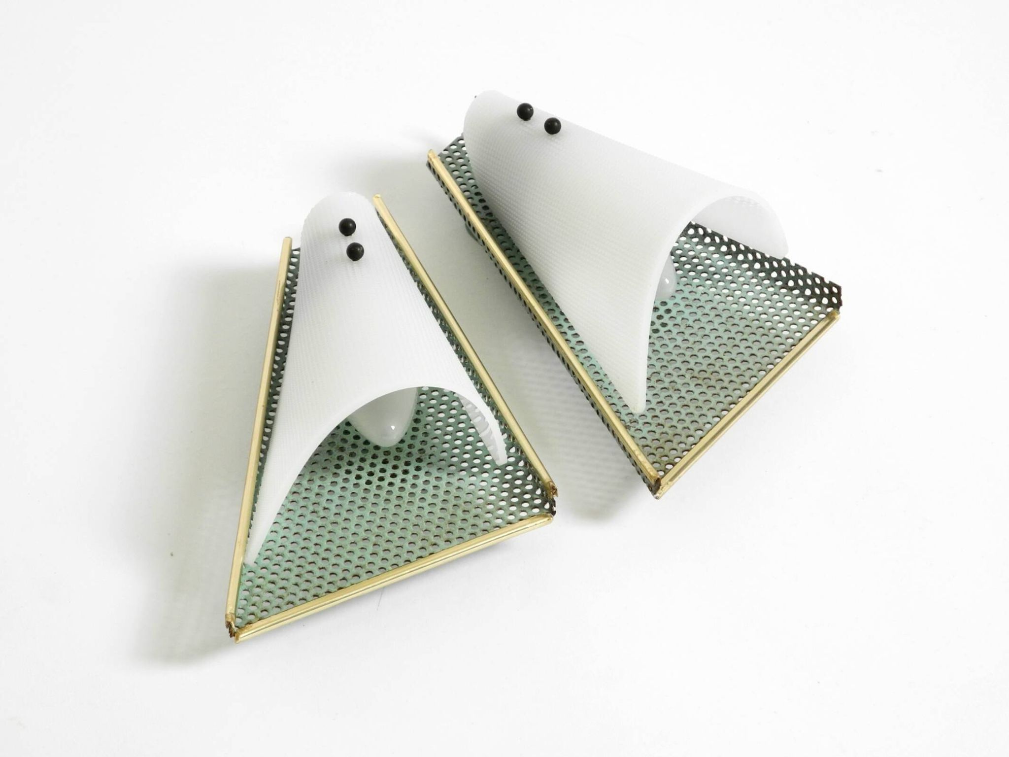 Pair of beautiful mint green Mid Century Modern perforated sheet metal wall