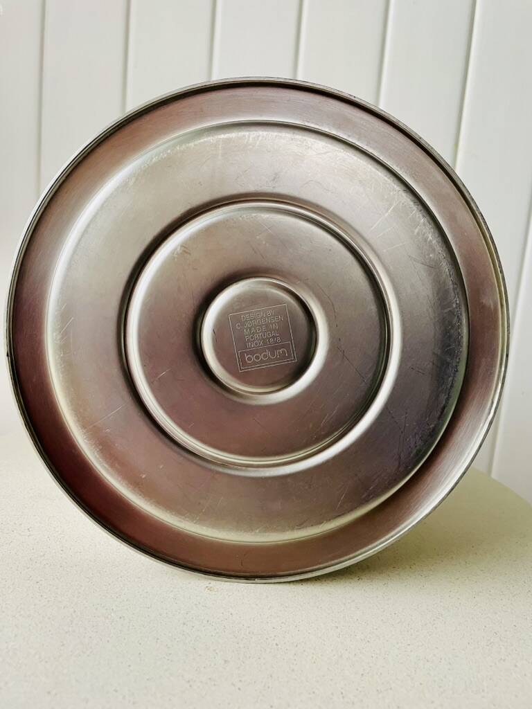 Vintage Bodum Ottoni stainless steel kettle designed by Carsten Jørgensen 1986, button.