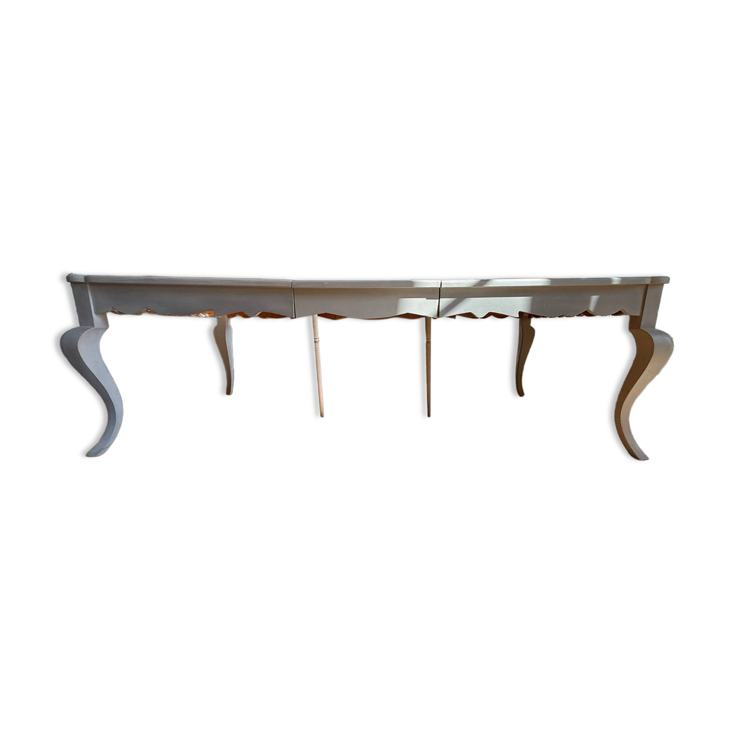 Large solid wood table made by a cabinetmaker.