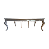 Large solid wood table made by a cabinetmaker.