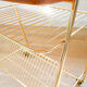 Vinyl service in gilded metal, with wooden top