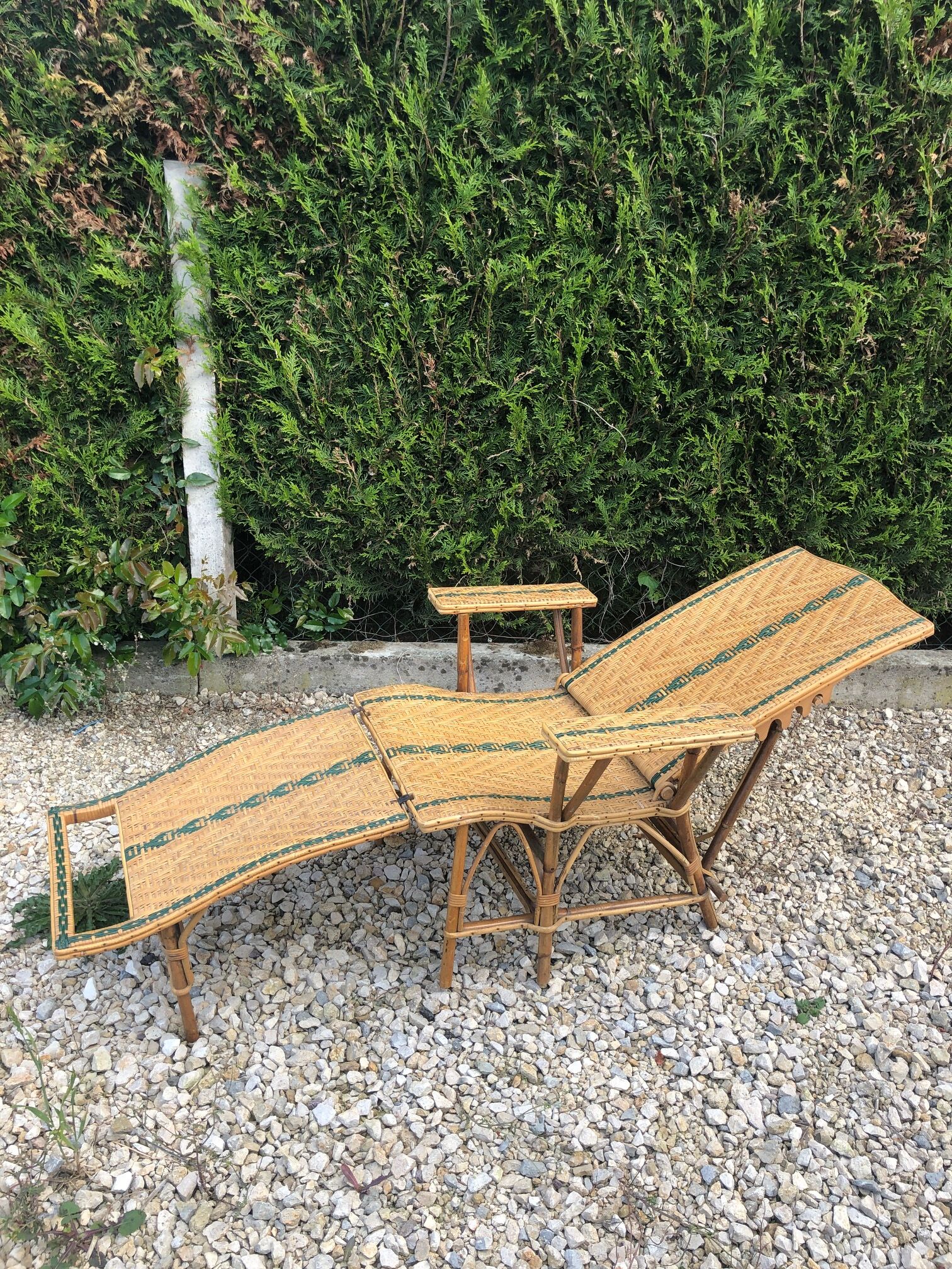 Rattan lounger with foot rest