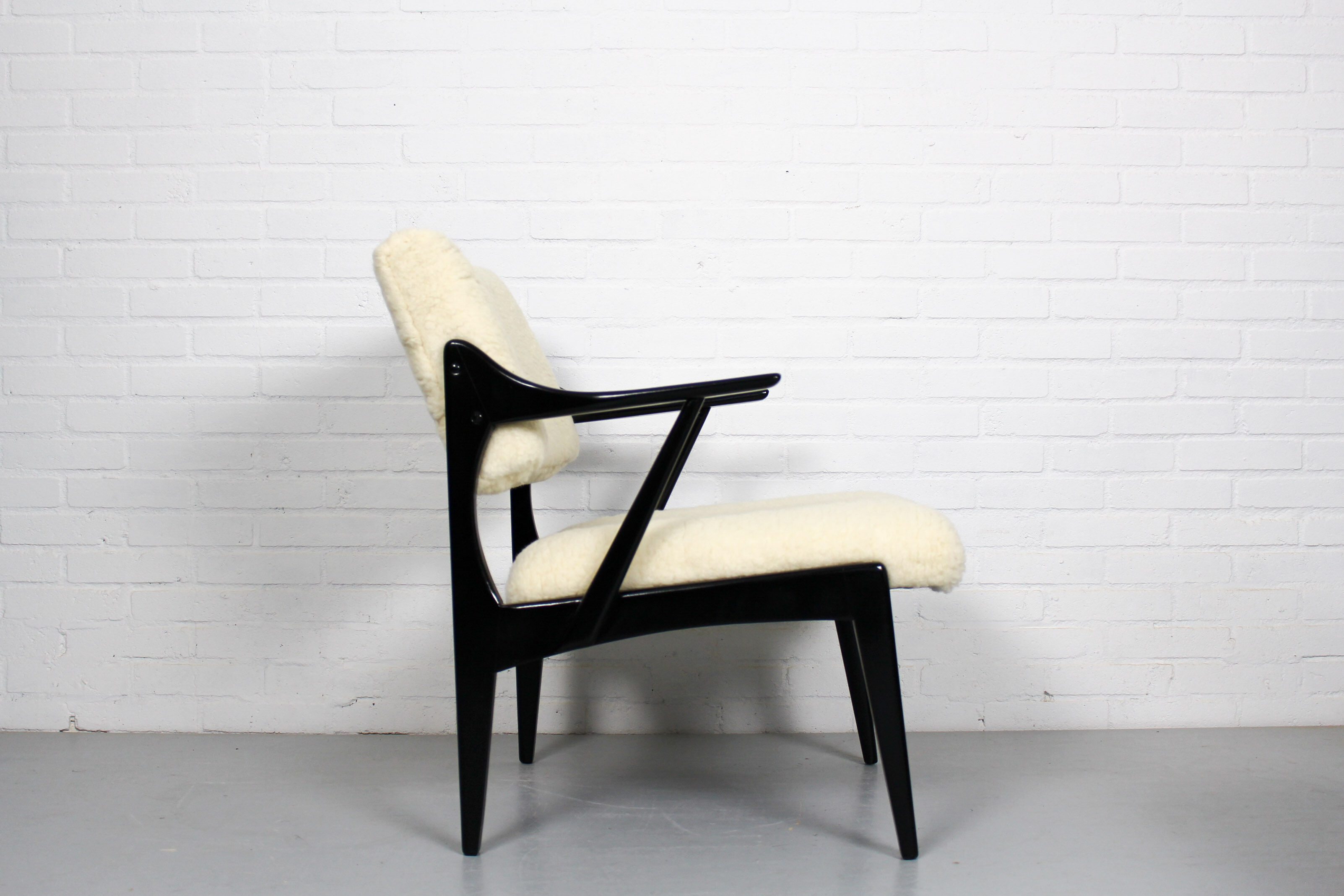 Set of 2 vintage armchairs with merino wool upholstery