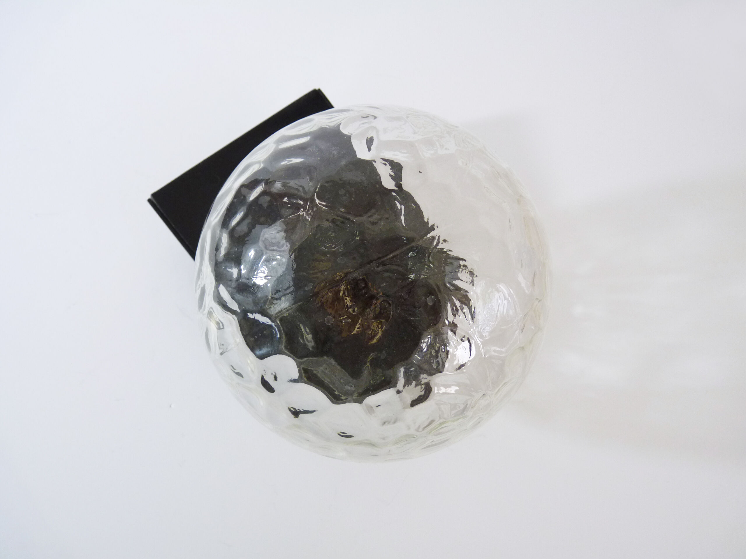 Vintage wall light plastic or bakelite structure, transparent glass globe. Year 70