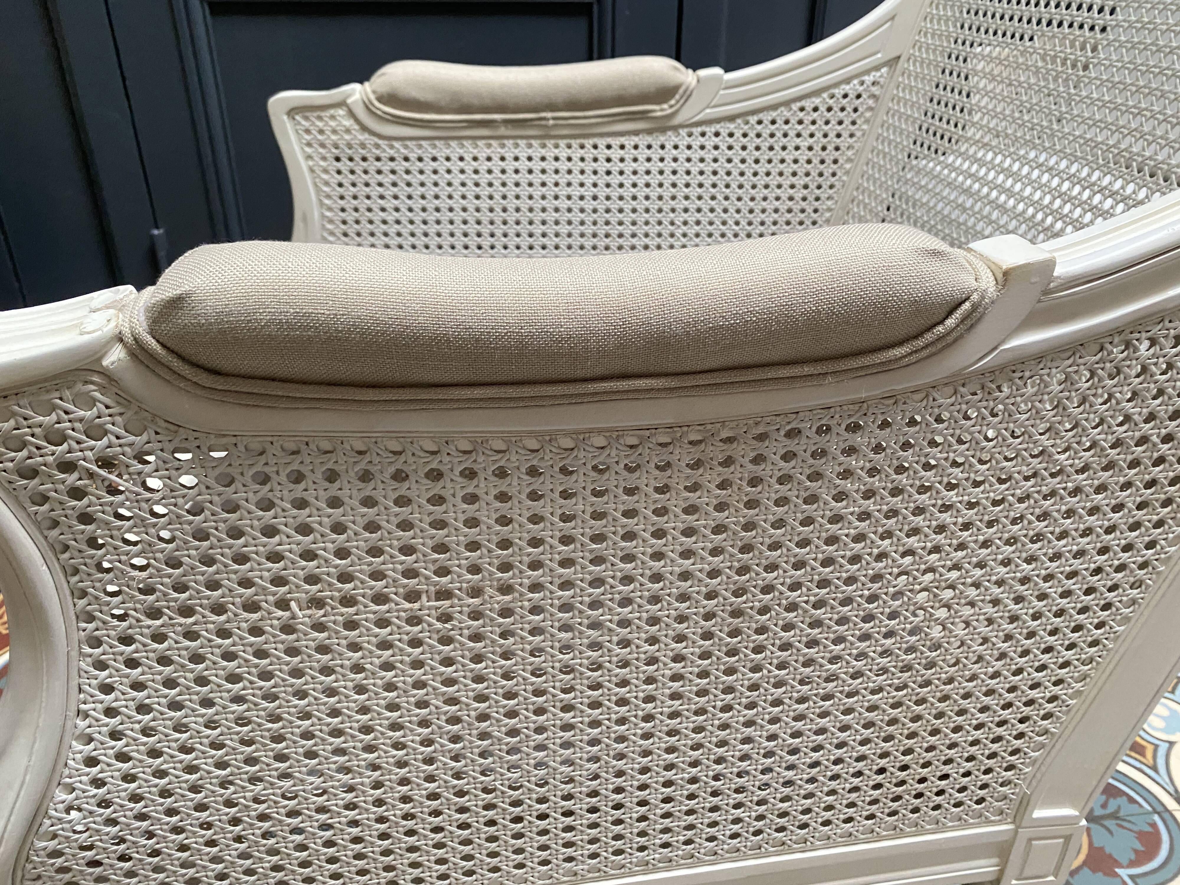 Pair of Louis XVI style caned Bergère armchairs