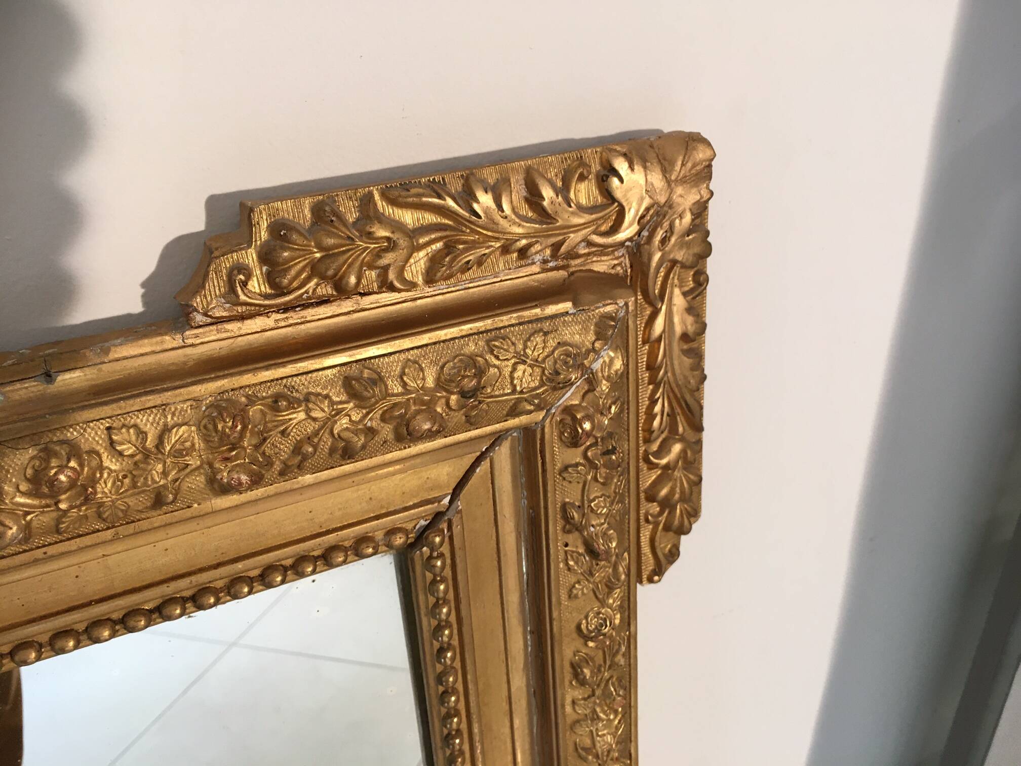 Louis XVI style and 19th century fireplace mirror