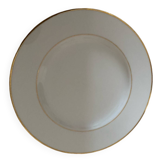 Assiettes plates en porcelaine blanche avec un filet doré