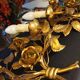 Pair of gold metal wall lights