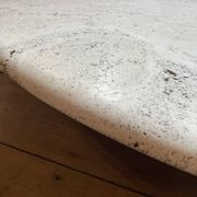 Round travertine coffee table, attributed to Angelo Mangiarotti, central cylindrical leg, 1970s