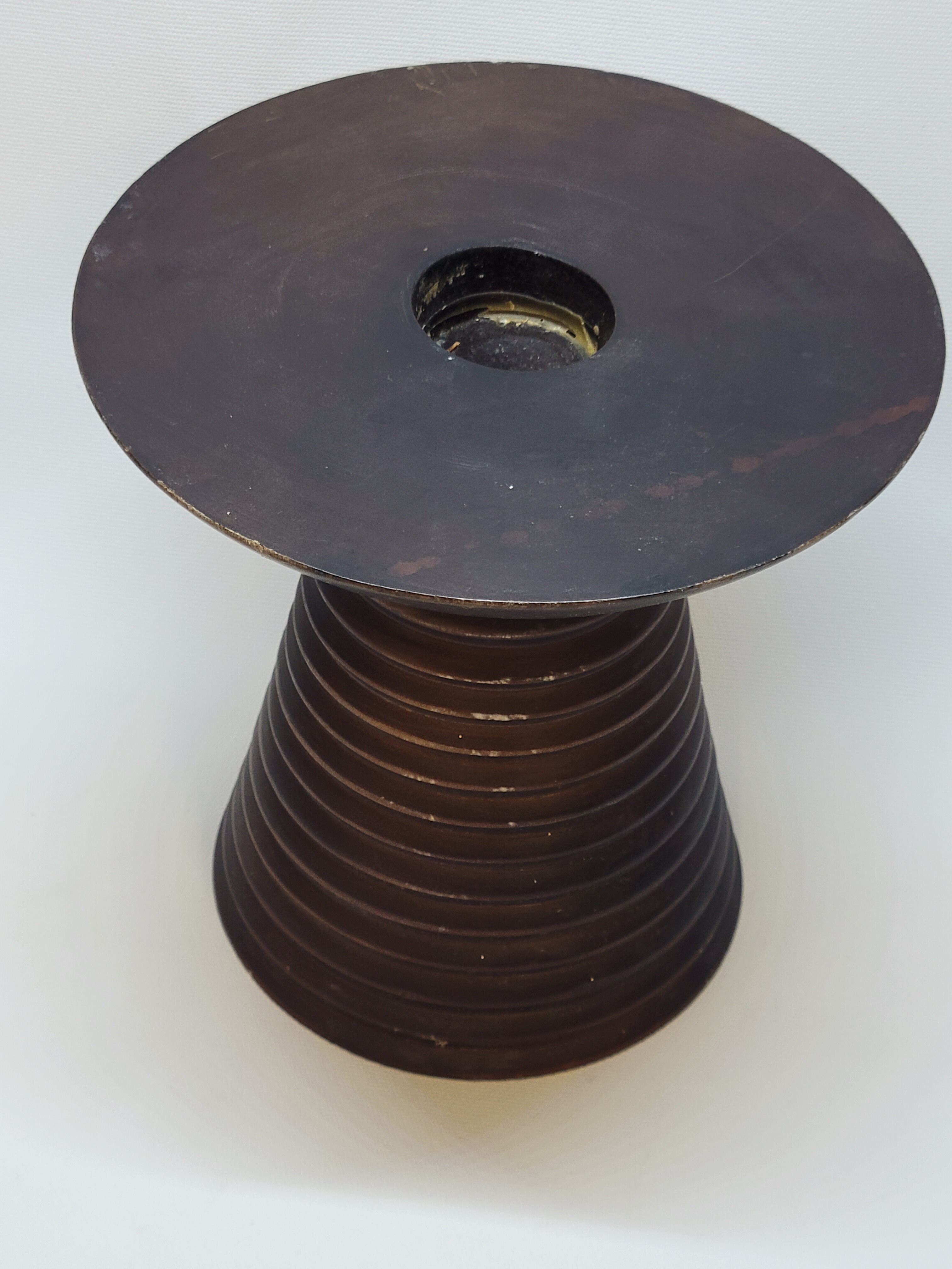 Scandinavian wooden candle holder turned sleek design