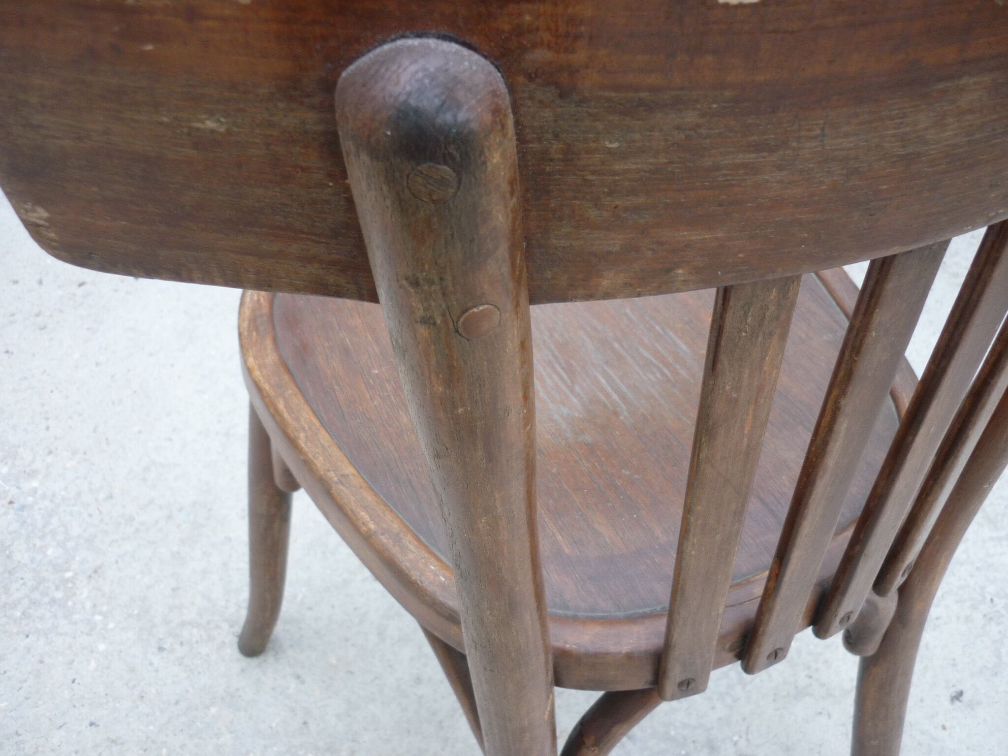 Pair of old bistro chairs with dark patina
