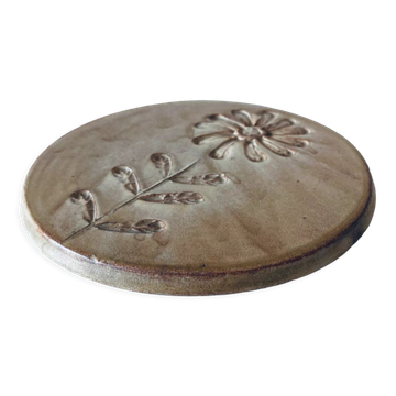 Dessous de plat ancien en céramique
