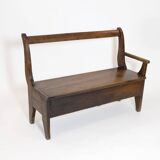 Handcrafted wooden bench with armrest and left drawer.