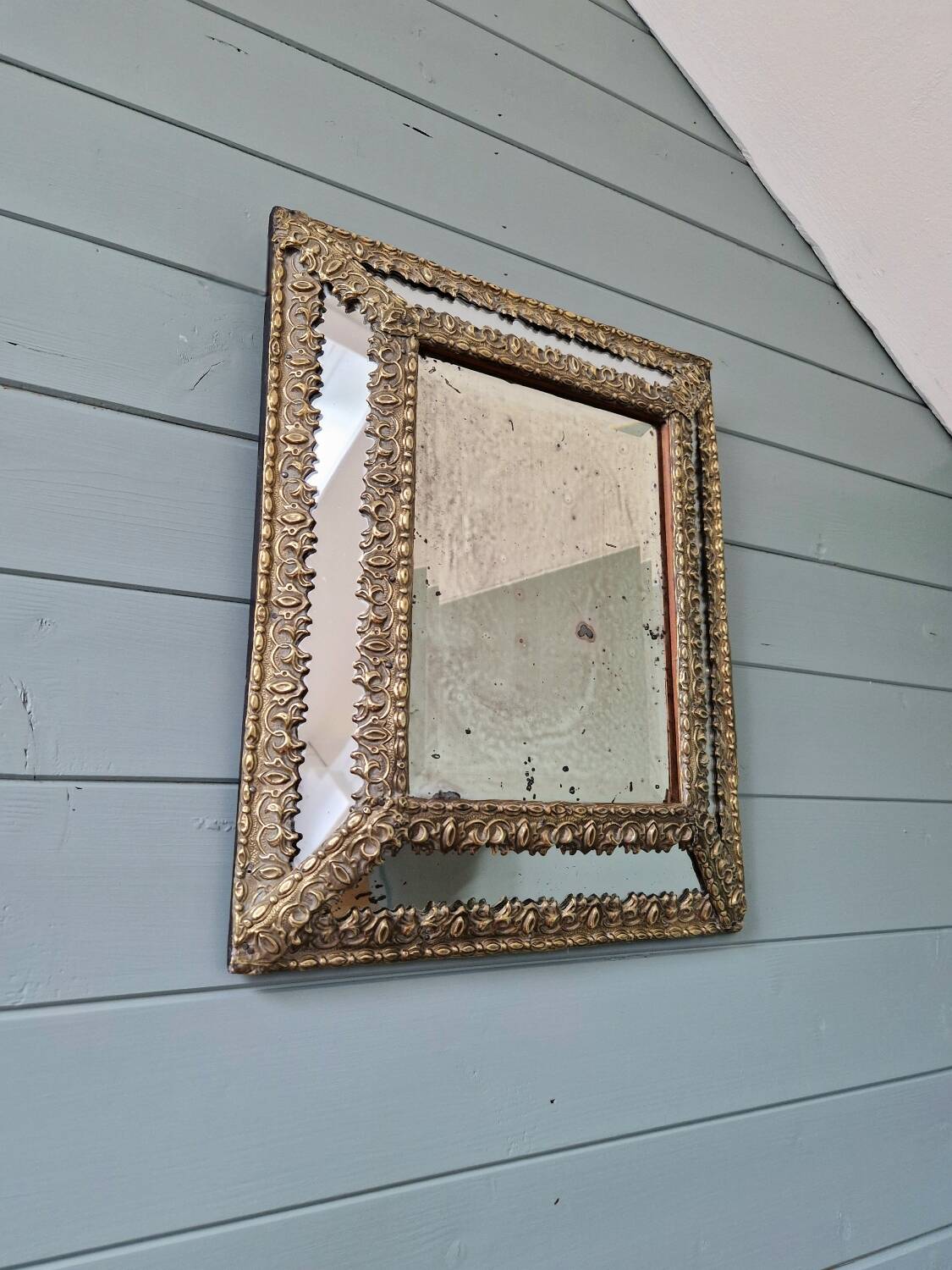 Mirror with embossed brass and mercury glass glazing beads, 19th century