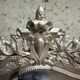 Grand miroir ancien fin XIXème siècle à fronton sculpté de style Louis Phil