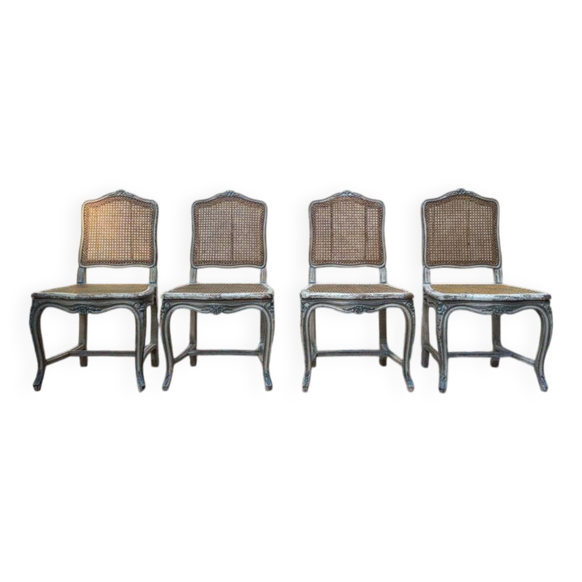 Suite de 4 chaises cannées de style Louis XV rechampi