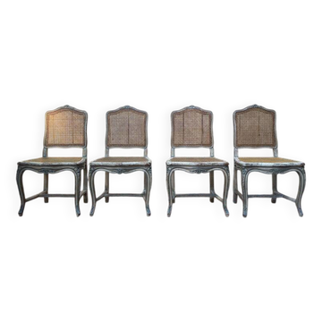 Suite de 4 chaises cannées de style Louis XV rechampi