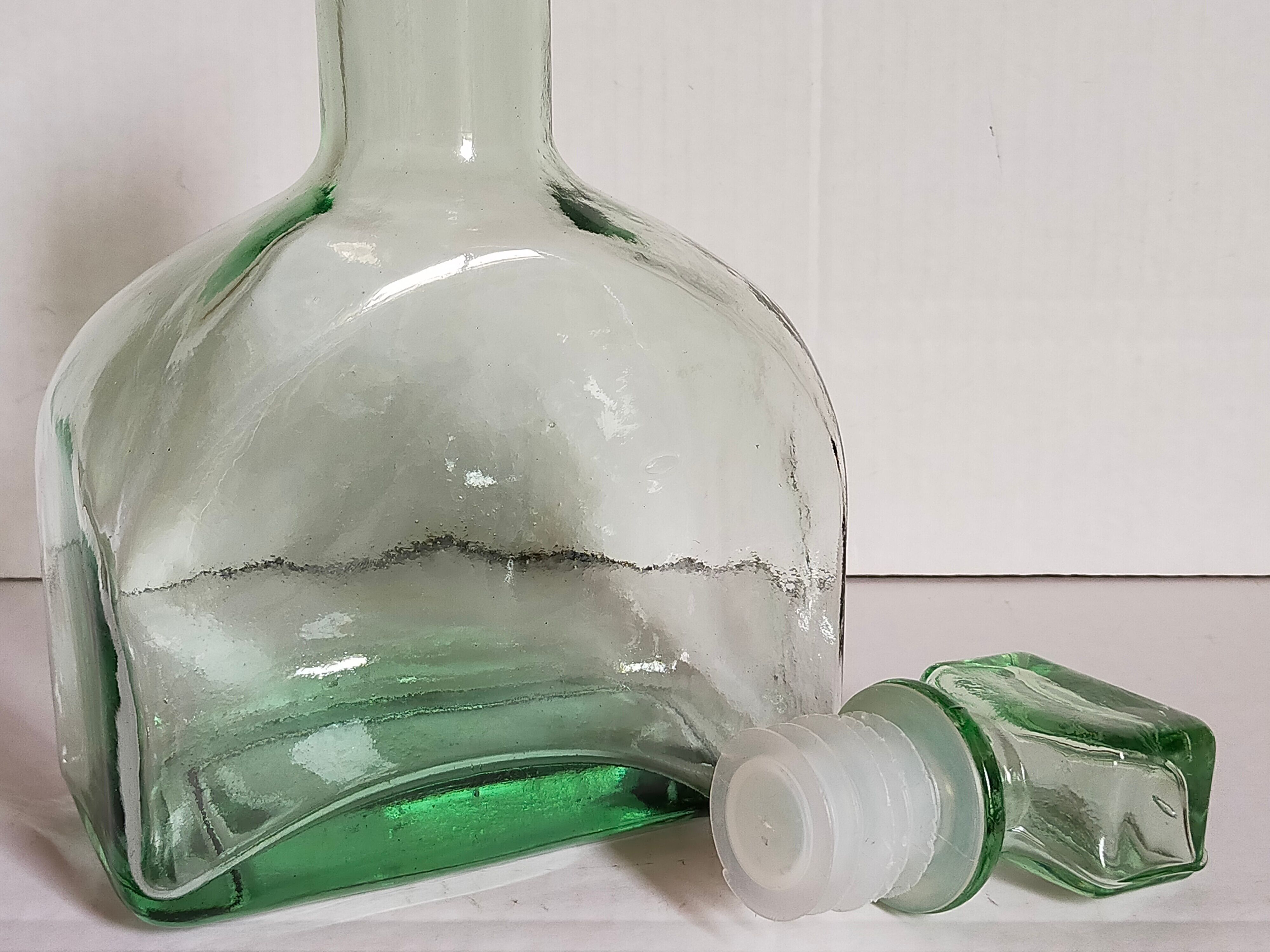 Vintage green glass whiskey decanter