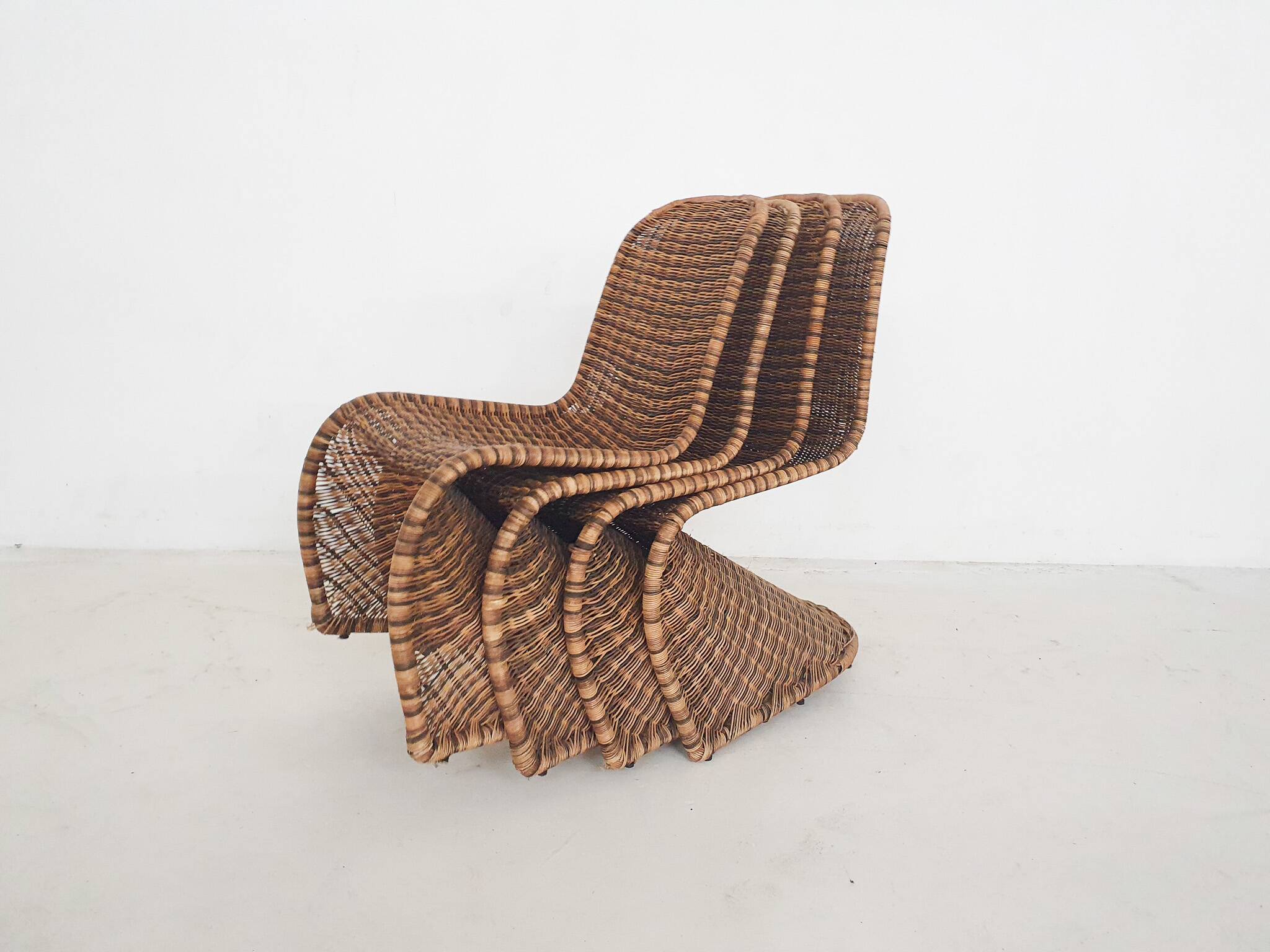 Set of four rattan S-chairs