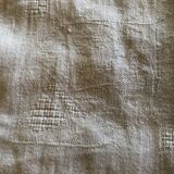 Old square table in damask cotton palm floral pattern
