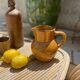 Antique glazed ceramic pitcher