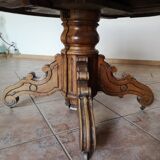 Old table with central leg, small casters, 2 extensions