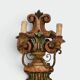 Pair of Polychrome Carved Wood Wall Lights with Vase and Acanthus. Arm in Iron.