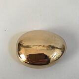 Bottle opener roller in gilded bronze by Monique Gerber
