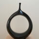 Sculptural black ring vase in ceramic