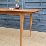 Single extension dining table by McIntosh