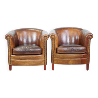 Set of 2 cognac-colored sheepskin club chairs