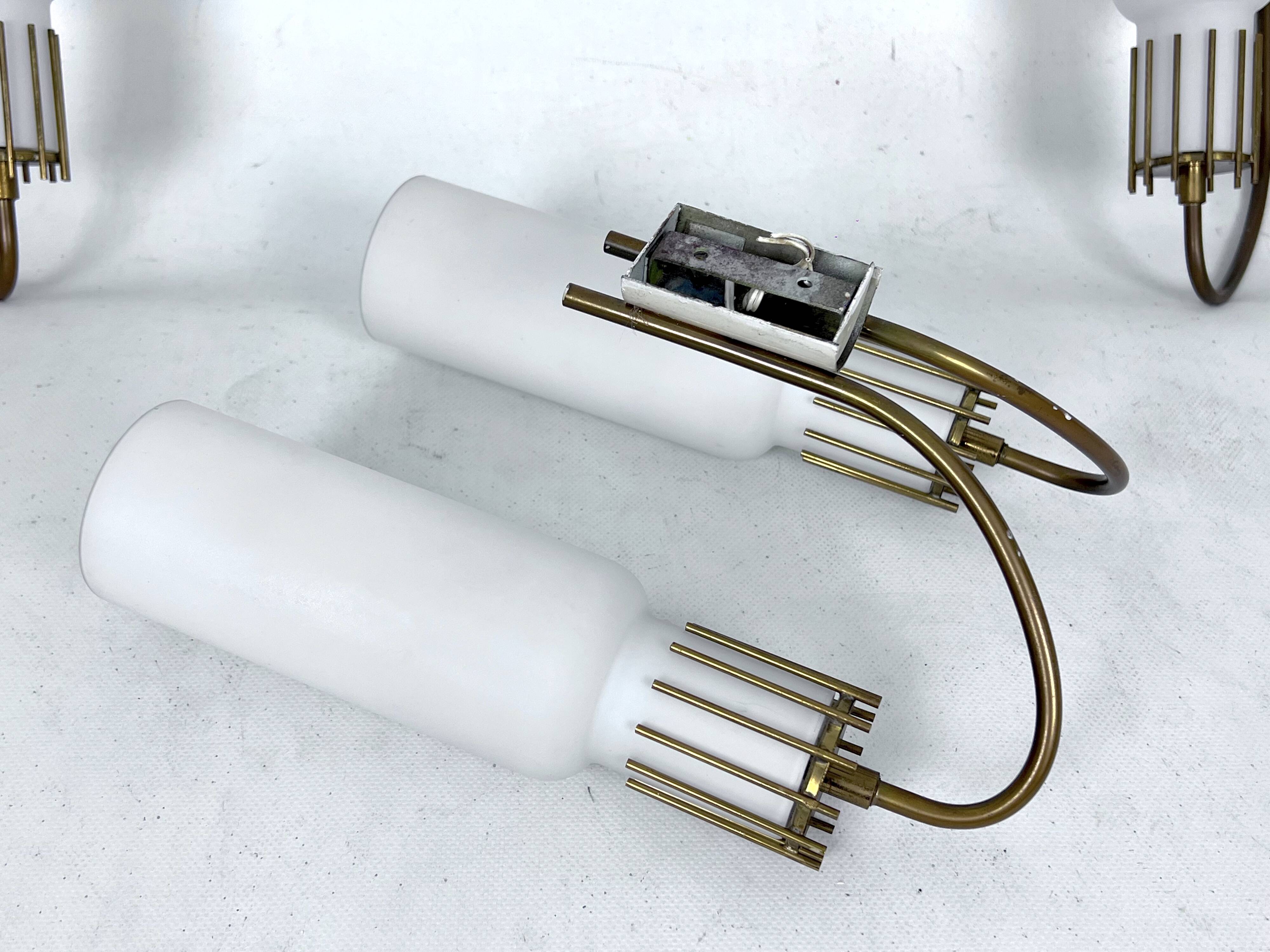 Mid-Century Modern set of three sconces in Arredoluce style. Italy 1950s