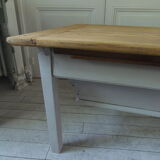 Coffee table made from an authentic farmhouse table, leg patinated pearl gray