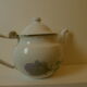 Teapot or coffee maker in old enamelled sheet metal