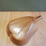 Empty wooden pocket in the shape of a vintage pear