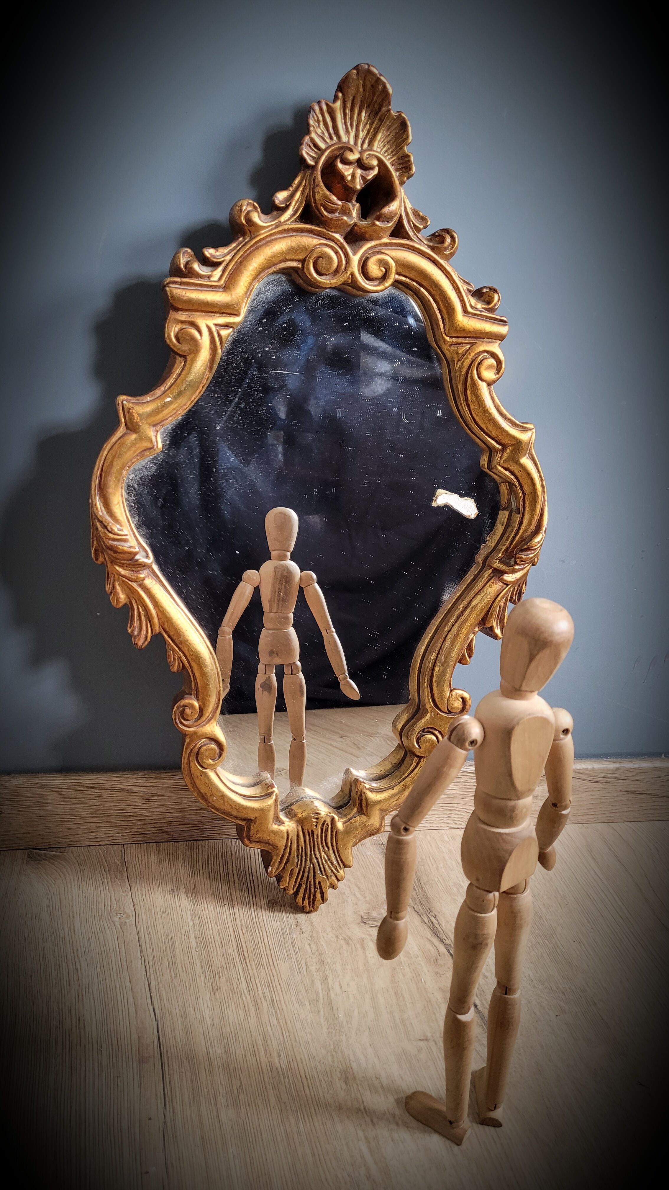 Gilded mirror worked 33x58cm
