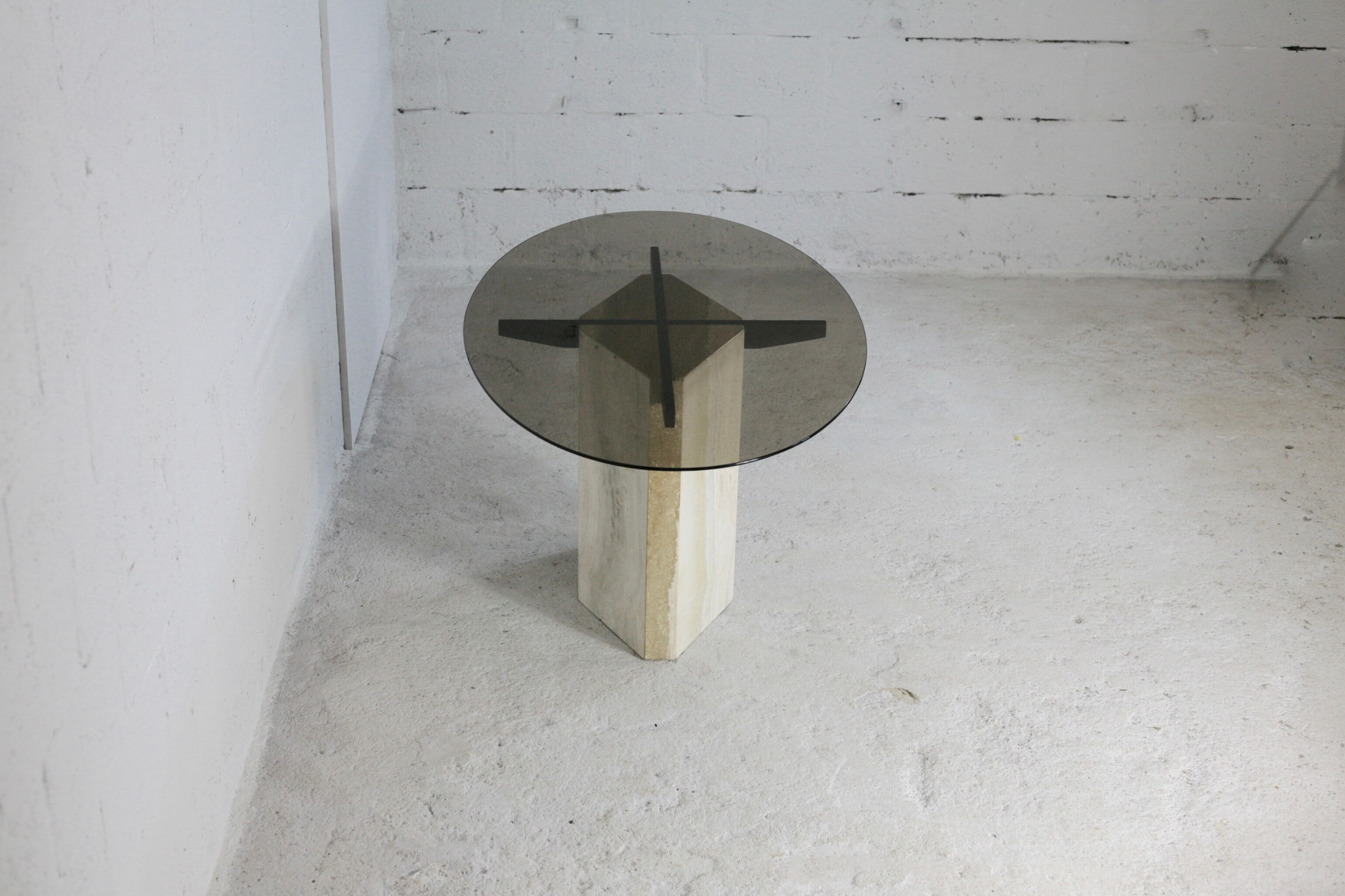 Living table, Comblanchian stone base and elliptical tray in smoked glass, Italy, 1970