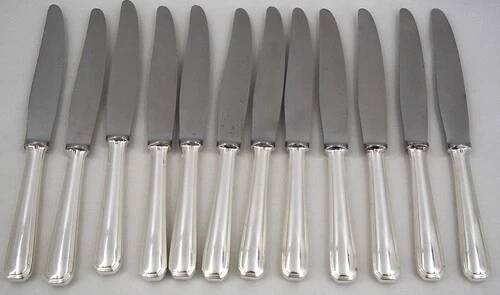 Christofle America, Art Deco 12 silver-plated table knives, excellent condition.