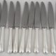 Christofle America, Art Deco 12 silver-plated table knives, excellent condition.