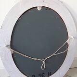 Antique oval mirror in painted wood