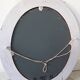 Antique oval mirror in painted wood